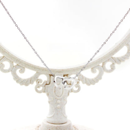 Collier rotatif à double cœur gravé, à pendentif réversible, avec boîte cadeau