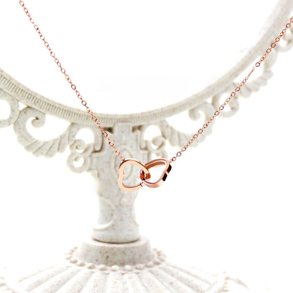 Collier rotatif à double cœur gravé, à pendentif réversible, avec boîte cadeau